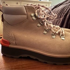 Sorel boots size 7. Worn one time. Great price for these trendy Sorel boots!